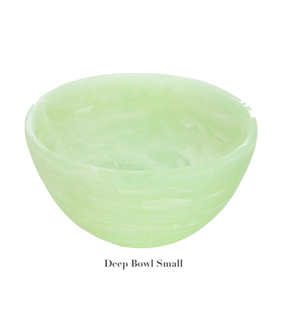 A small, light green bowl from the Nashi Home Mint Resin Serveware Collection features a smooth, rounded shape and shatter-resistant design—perfect for stylish home decor and everyday use.
