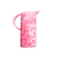 Part of the Pink Swirl Collection by Nashi Home, this tall marbled pink and white pitcher with a handle is ideal for entertaining or adding elegance to your decor, shown against a plain white background.