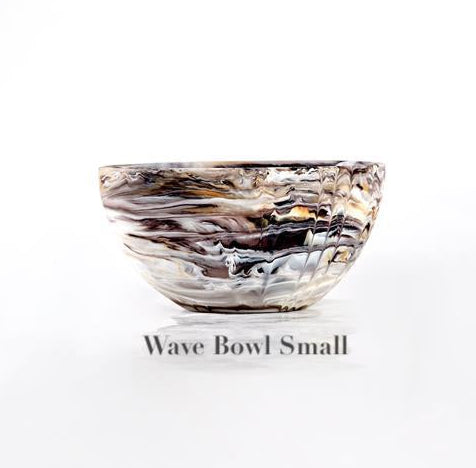 A small glass-look bowl with swirling brown, black, and white patterns from the Mocha Resin Serveware Collection by Nashi Home—a stunning, food-safe piece perfect for decor or versatile serving.