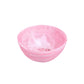 Part of the Pink Swirl Collection by Nashi Home, this small, round light pink marbled bowl is perfect for entertaining or adding a stylish touch to your home decor.