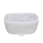 A white, rectangular tub from the Nashi Home White Resin Serveware Collection features rounded corners, handles on both sides, and "Party Tub" printed below—making it a stylish, versatile decor piece.
