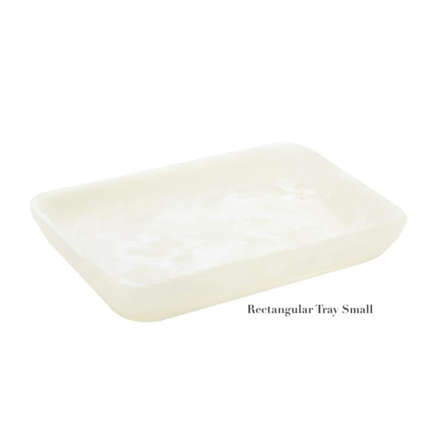 The Nashi Home White Resin Serveware Collection features a small rectangular tray with raised edges and a glossy finish—ideal for serving or decor. Text reads "Rectangular Tray Small." Shown on a plain white background.