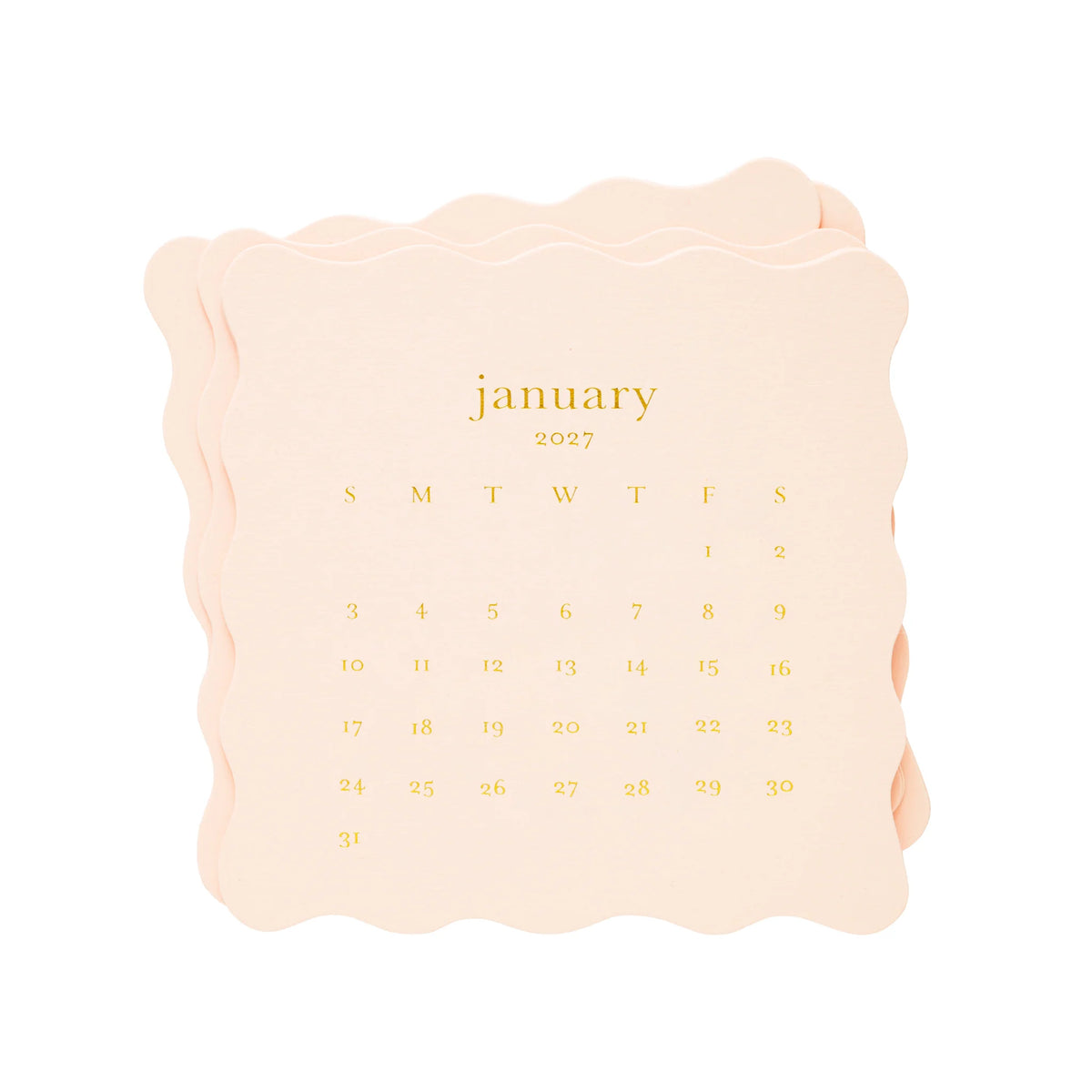 A stack of peach-colored Sugar Paper 2027 Desk Calendar pages with scalloped edges showing the month of January.