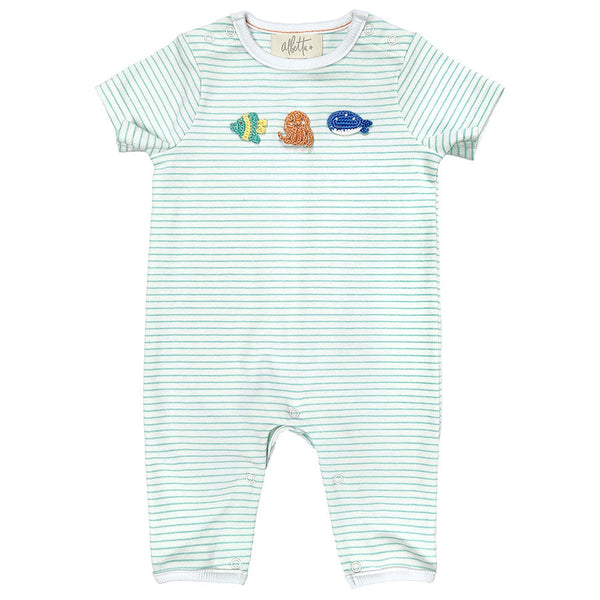 The Albetta Romper, Mini Ocean by Albetta features delicately embroidered aquatic animals, including two fish and a seashell, on the front.