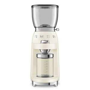 The Smeg Coffee Grinder, from the SMEG Coffee Grinder Collection, in cream, features a clear hopper and container with a shiny metallic side knob for perfect grind adjustments.