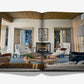 Open to a stunning photo of a modern living room with armchairs, a fireplace, and built-in shelves—“Relaxed Luxury” by Assouline captures Chad Dorsey’s signature laid-back elegance in interior design.