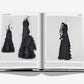 An open book from Assouline titled "Chanel: The Legend of an Icon" reveals black and white images of a 1930s evening ensemble with ruffled layers, reminiscent of Chanel's timeless couture, elegantly displayed from different angles.