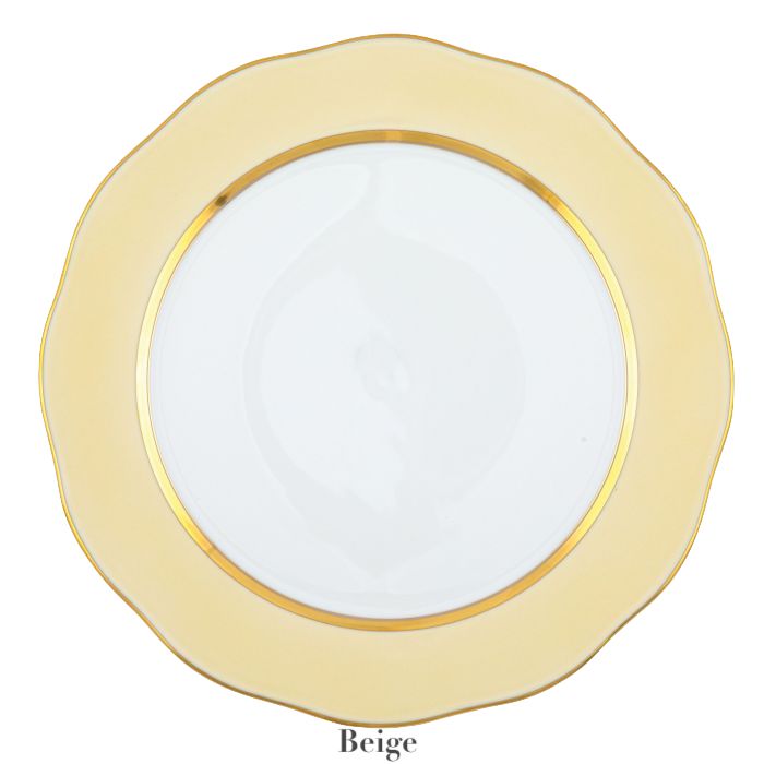 The Herend Silk Ribbons Charger features a round plate with a white center, scalloped beige border, and gold rim—perfect for an elegant tabletop setting. "Beige" appears beneath the plate.