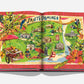 An open book titled "Santo Domingo" by Assouline features a colorful map of Santo Domingo with Zona Colonial, tropical plants, iconic landmarks, and a vibrant parrot near the Malecón.