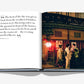 An open book from Assouline's "Kyoto Serenity" shows a left page of text and a right page photo of three people in front of a traditional building at night, capturing the essence of Japanese culture.