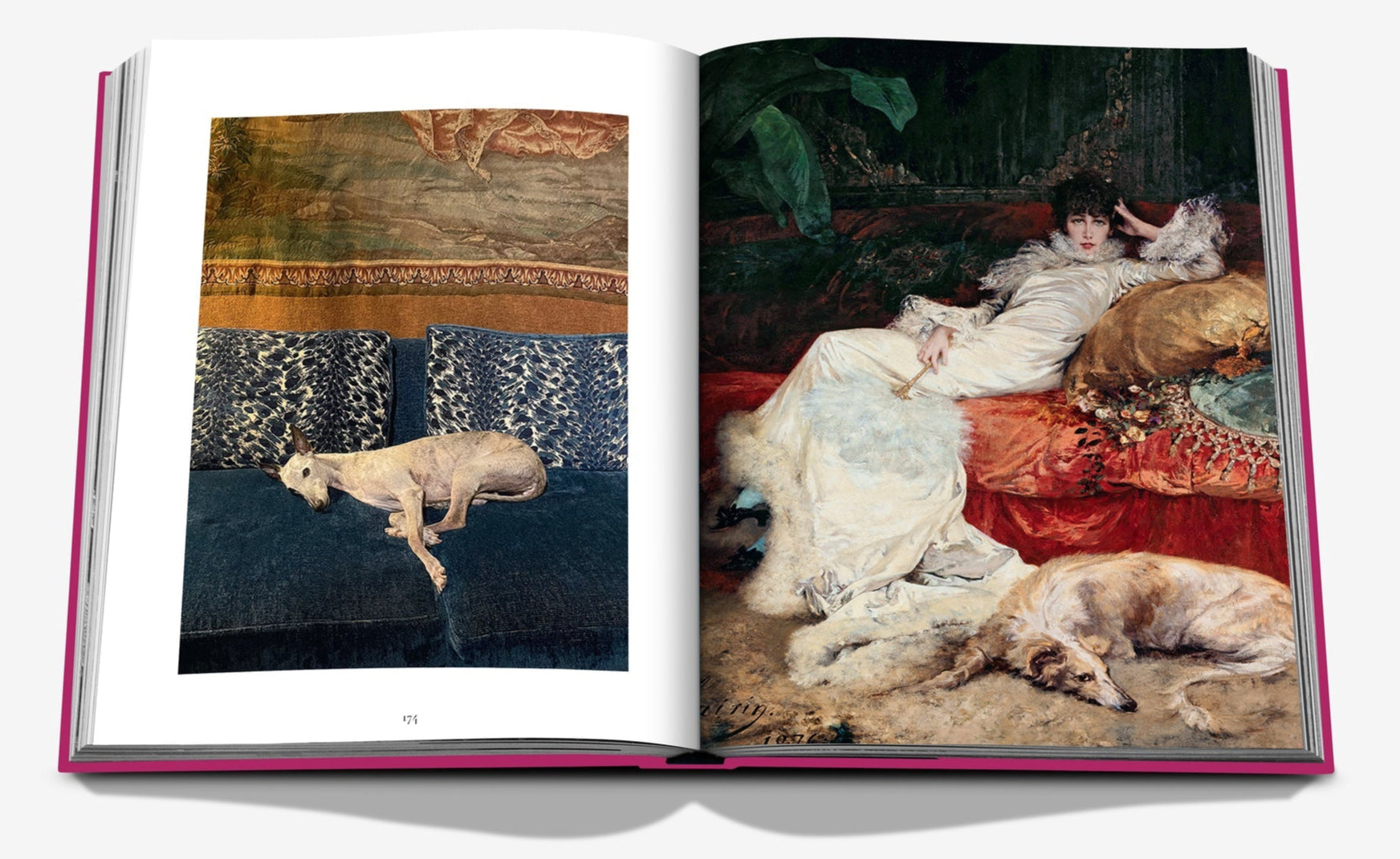 An open book, "Chic Dogs" by Assouline, displays a stylish scene: the left page features a dog lounging elegantly on a patterned couch, while the right showcases a luxurious painting of a woman with her relaxed companion.