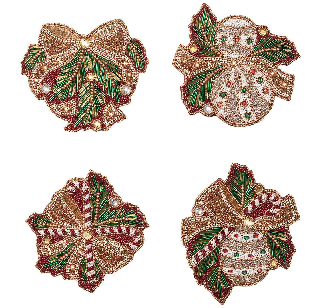 Kim Seybert Candy Cane Bow Coasters featuring four beaded designs with decorative bows, ornaments, candy canes, and evergreen sprigs.