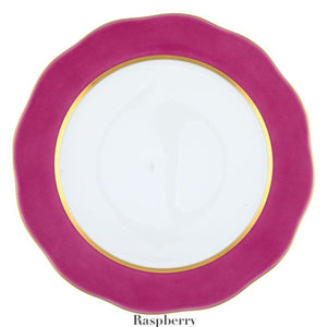 A white Herend Silk Ribbons Charger with a blue wavy edge and a gold trim, showcasing the elegance of handmade porcelain. At the bottom of the image, the label "Herend" emphasizes its unique craftsmanship.