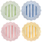 The Juliska Cabana Stripe Melamine Dinnerware Collection features four round shatterproof plates with scalloped edges and vertical stripes in green, blue, pink, and yellow, arranged in a 2x2 grid on a white background.