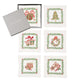 Set of five Christmas Trellis Cocktail Napkins featuring embroidered Christmas motifs in evergreen frames, displayed with their gift box.