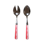 The Addison Ross Wave Salad Server Set features two servers with shiny metal heads and pink handles with a wavy white design, shown side by side on a white background.
