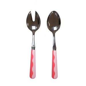 The Addison Ross Wave Salad Server Set features two servers with shiny metal heads and pink handles with a wavy white design, shown side by side on a white background.