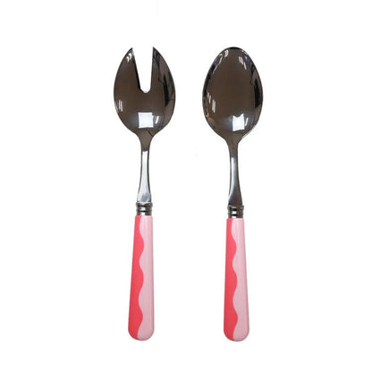 The Addison Ross Wave Salad Server Set features two servers with shiny metal heads and pink handles with a wavy white design, shown side by side on a white background.