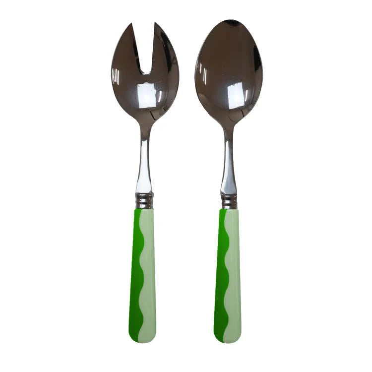 The Addison Ross Wave Salad Server Set features stainless steel tops and green-and-white wavy handles, shown side by side on a white background.
