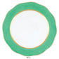 A white plate with a mint green scalloped rim and gold trim, perfect for elevating any table setting or pairing beautifully with the Herend Silk Ribbons Charger.