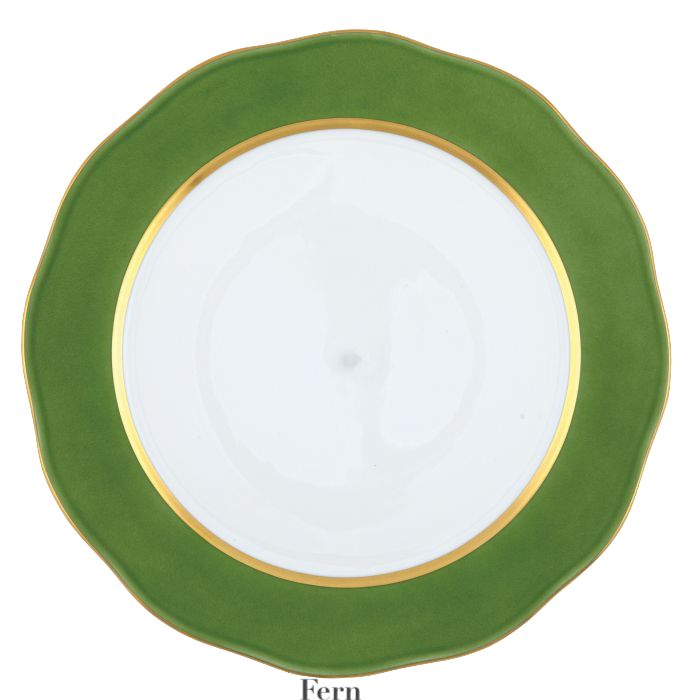 A handmade porcelain plate with a wavy green border and gold rim, shown from above—perfect for enhancing your table or pairing with the Herend Silk Ribbons Charger.