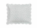 The Celine Bedding Collection, Grass by Matouk features a rectangular pillow with small green dots on white Egyptian cotton percale, embroidered scalloped edge, and OEKO-TEX Standard 100 certification.