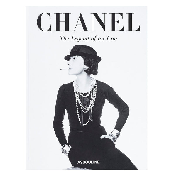 A black-and-white book cover titled "Chanel: The Legend of an Icon" by Assouline shows a woman in couture elegance, wearing a black outfit with pearls and a chic hat.