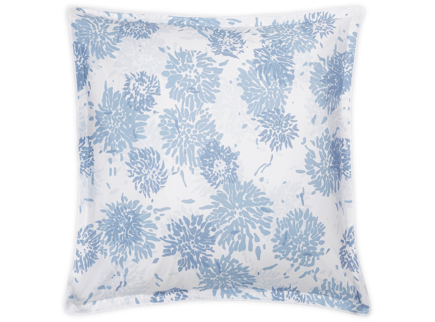 The Matouk Tillett x Matouk Chrysanthemum Bedding Collection in Blue features a square pillow with a white background and blue chrysanthemum motif, echoing classic Tillett Textiles’ abstract floral designs.