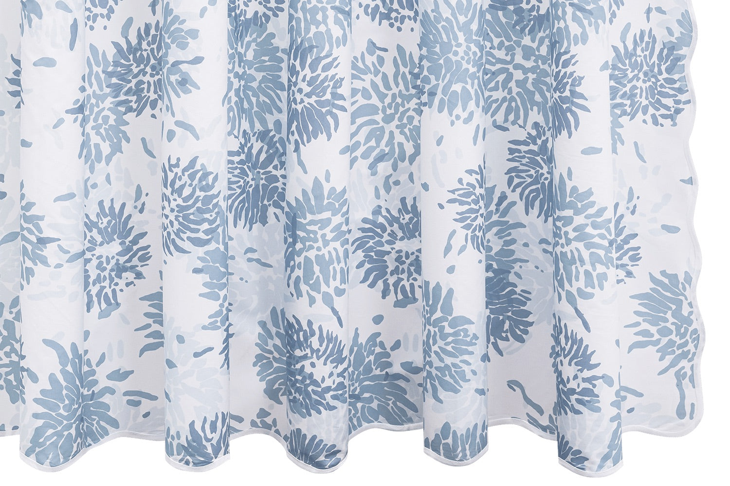 The Chrysanthemum Shower Curtain Collection by Matouk features slightly sheer white fabric with a repeating blue chrysanthemum motif in the Tillett style, designed to hang in gentle folds.