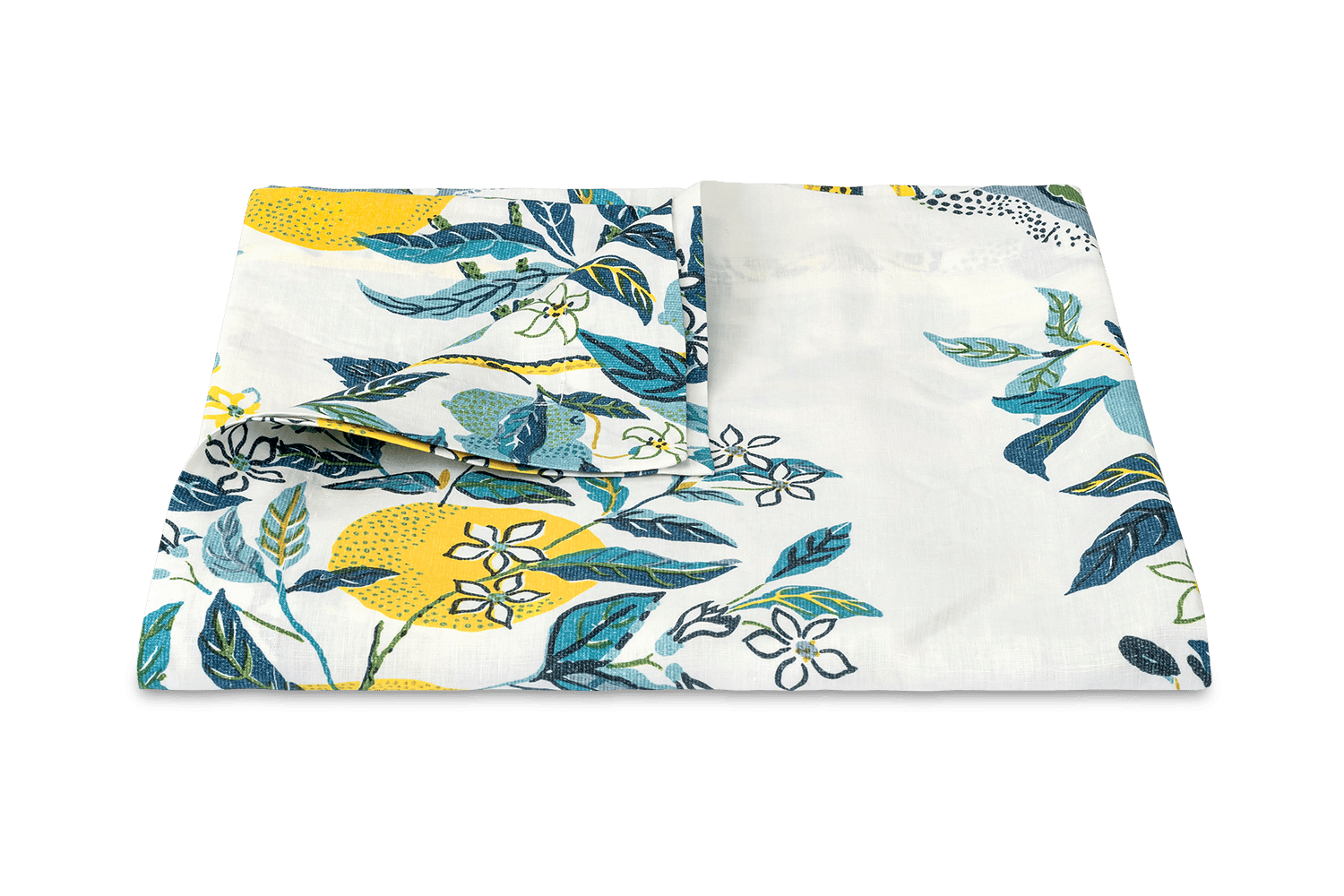 A folded Matouk Citrus Garden Pool Collection linen tablecloth featuring a printed pattern of yellow lemons, green leaves, and blue foliage.