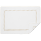 The Matouk Classic Chain Bath Collection features a white rectangular cotton terry towel with a beige classic chain border, shown laid flat with one corner folded over.