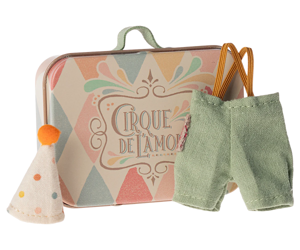 The Maileg Clown Clothes in Suitcase for Little Brother Mouse includes a charming miniature metal suitcase adorned with "Cirque de l'amour," a white polka-dotted party hat featuring an orange pom-pom, and a delightful set of clown clothes, including green fabric overalls. Perfect for your little brother mouse!