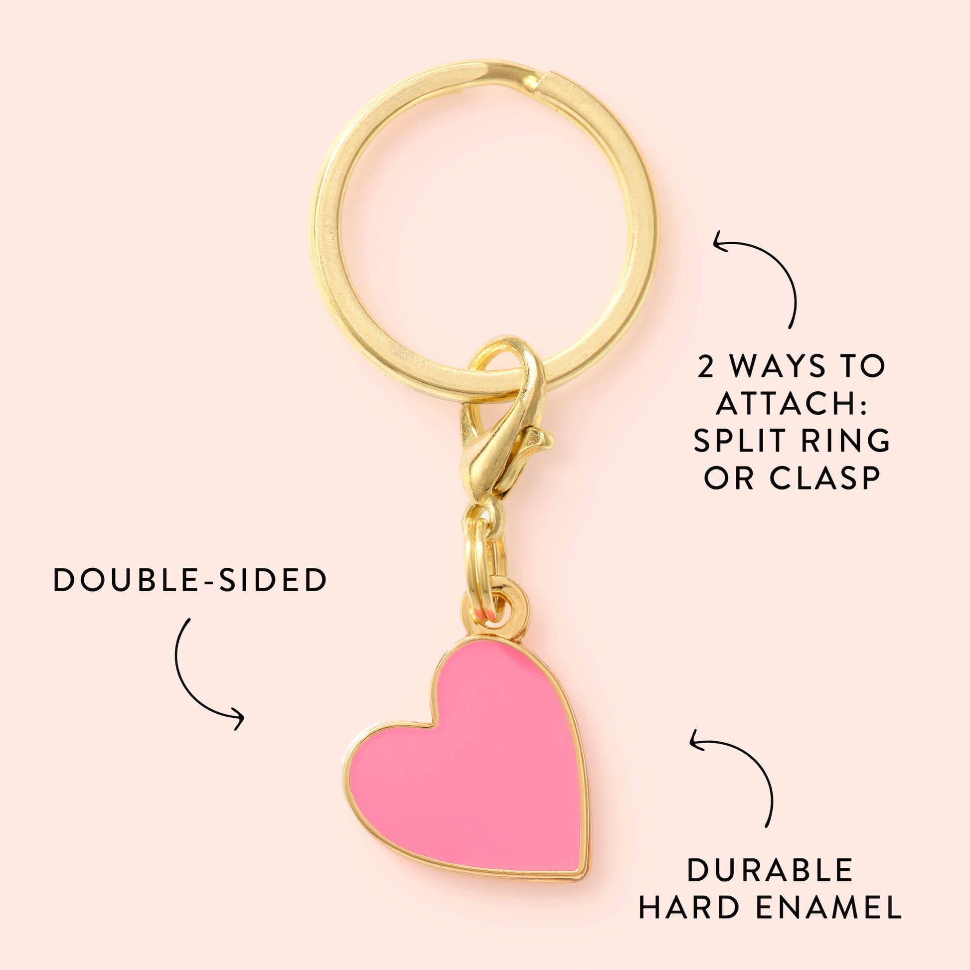 The Foggy Dog Heart Collar Charm is a gold keychain with a pink double-sided heart, durable hard enamel finish, split ring and clasp for versatile attachment—ideal as a pet collar accessory or stylish dog charm.