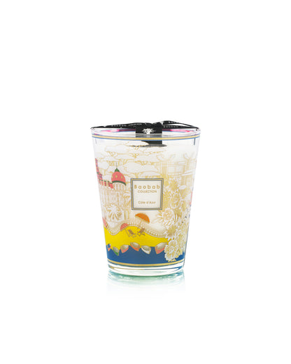 The Baobab Collection Cities Côte d’Azur Candle by Baobab comes in a glass container with colorful, intricate screen-printed decor and a black ribbon on top. The label reads “Baobab Collection Côte d’Azur.”.