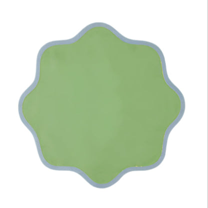 The Daisy Table Linen Collection by Duggan Society features a green, scalloped-edged design with a light blue border on white, evoking the look of elegant linen or scalloped edge napkins.