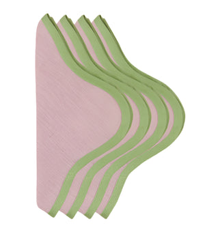 Five reusable, light pink cloth pads from the Duggan Society Daisy Table Linen Collection with green trim are stacked in a fanned arrangement on a white background.