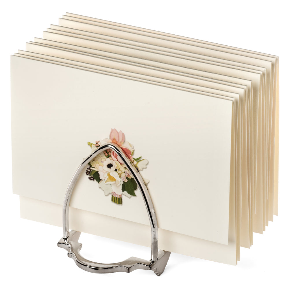 The Karen Adams Letter Holder displays cream-colored cards with a floral bouquet design, creating a charming and elegant desk accessory.