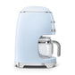 A SMEG Drip Filter Coffee Machine from Smeg in light blue, featuring a retro design with a glass carafe and chrome accents for perfect brews every time.