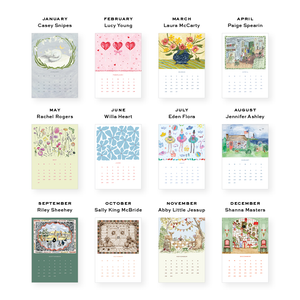 The Dogwood-Hill 2026 Desktop Calendar Set features original artwork by various artists, with unique illustrations above each monthly grid from January to December and each artist's name highlighted every month.
