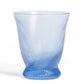The Chic Gift Hamper by Sharland England features a blue glass cup with a flared rim and spiral texture—perfect for pairing with hand-poured candles or artisanal gifts for a thoughtful, unique present.