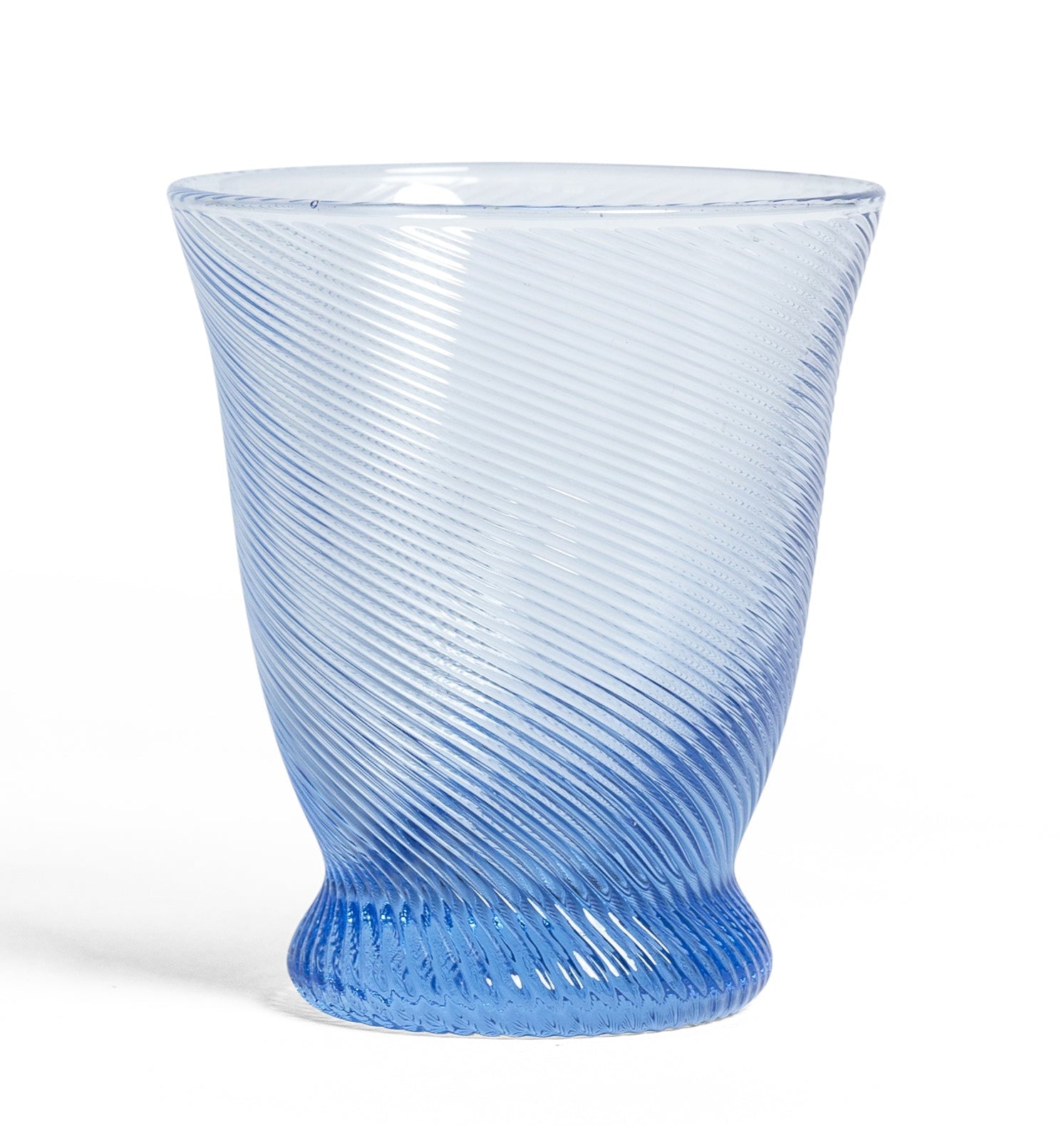 The Chic Gift Hamper by Sharland England features a blue glass cup with a flared rim and spiral texture—perfect for pairing with hand-poured candles or artisanal gifts for a thoughtful, unique present.