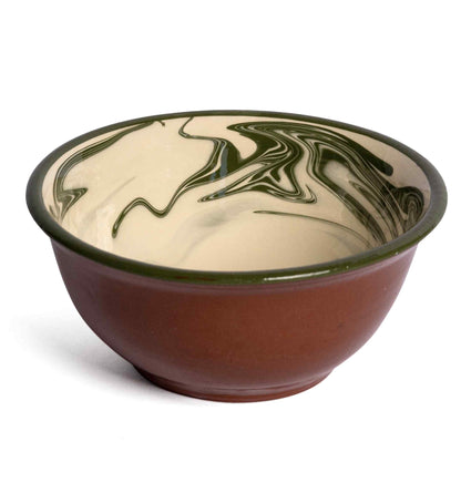A ceramic bowl from Sharland England's Marbre Serveware Collection, featuring a brown exterior, cream interior, and a striking green marbled pattern.