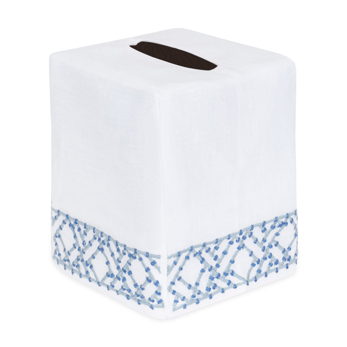 The Lido Bath Collection tissue box cover by Haute Home is crafted from premium white linen and features a blue embroidered geometric pattern near the base, complemented by a rectangular opening on top for easy tissue dispensing—an elegant addition to your home décor.