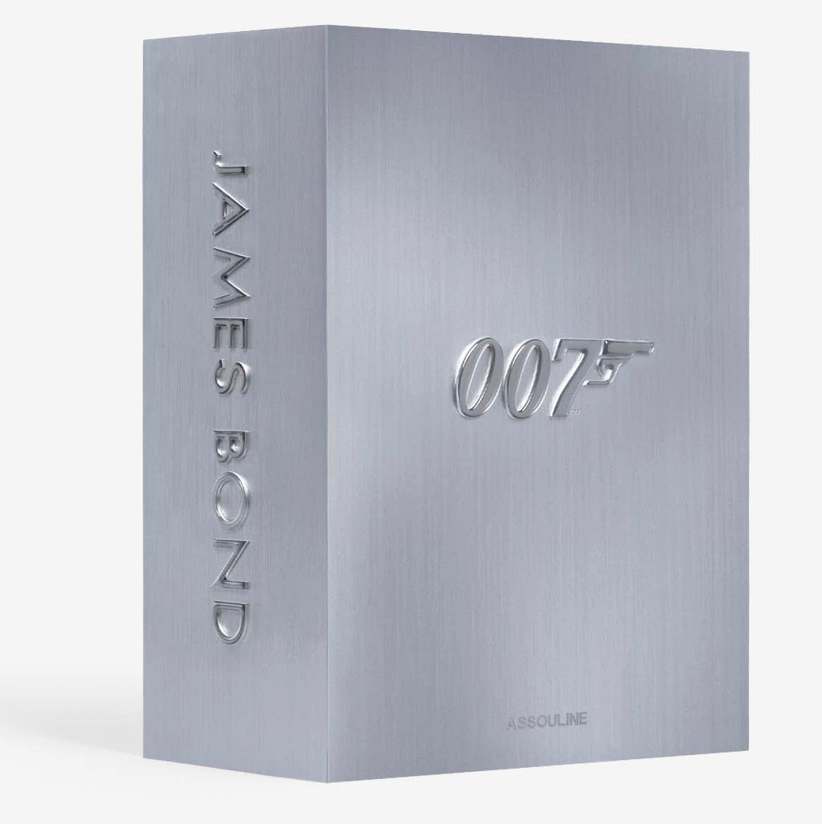 The James Bond Trilogy with Slipcase by Assouline features a silver metallic case with "JAMES BOND" on the spine and a "007" logo—an impressive collector’s edition for fans of James Bond coffee table books.
