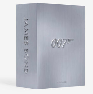 The James Bond Trilogy with Slipcase by Assouline features a silver metallic case with "JAMES BOND" on the spine and a "007" logo—an impressive collector’s edition for fans of James Bond coffee table books.