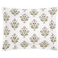 Square pillow from the Dalila Bedding Collection by Matouk, featuring a white background with a repeating green and beige floral pattern inspired by Schumacher block print.