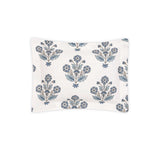Matouk’s Dalila Bedding Collection pillowcase features a white rectangular design adorned with blue and gray floral clusters and leaves, inspired by Schumacher block prints, and is showcased on a plain white background.
