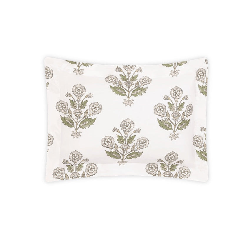 Rectangular white pillowcase from the Dalila Bedding Collection by Matouk, featuring a vibrant repeating floral and leaf motif inspired by Schumacher block prints, crafted from smooth Luca percale and shown against a plain white background.