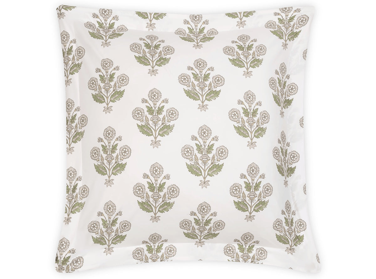 Explore the Dalila Bedding Collection by Matouk, featuring a white rectangular pillowcase adorned with rows of green and brown floral motifs inspired by vibrant Schumacher block print designs, expertly crafted in soft Luca percale.