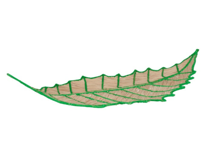 The Mercedes Salazar Mini Leaf Tray, crafted from natural woven raffia with a beige base and green edges and veins, captures tropical vibes against a white background.